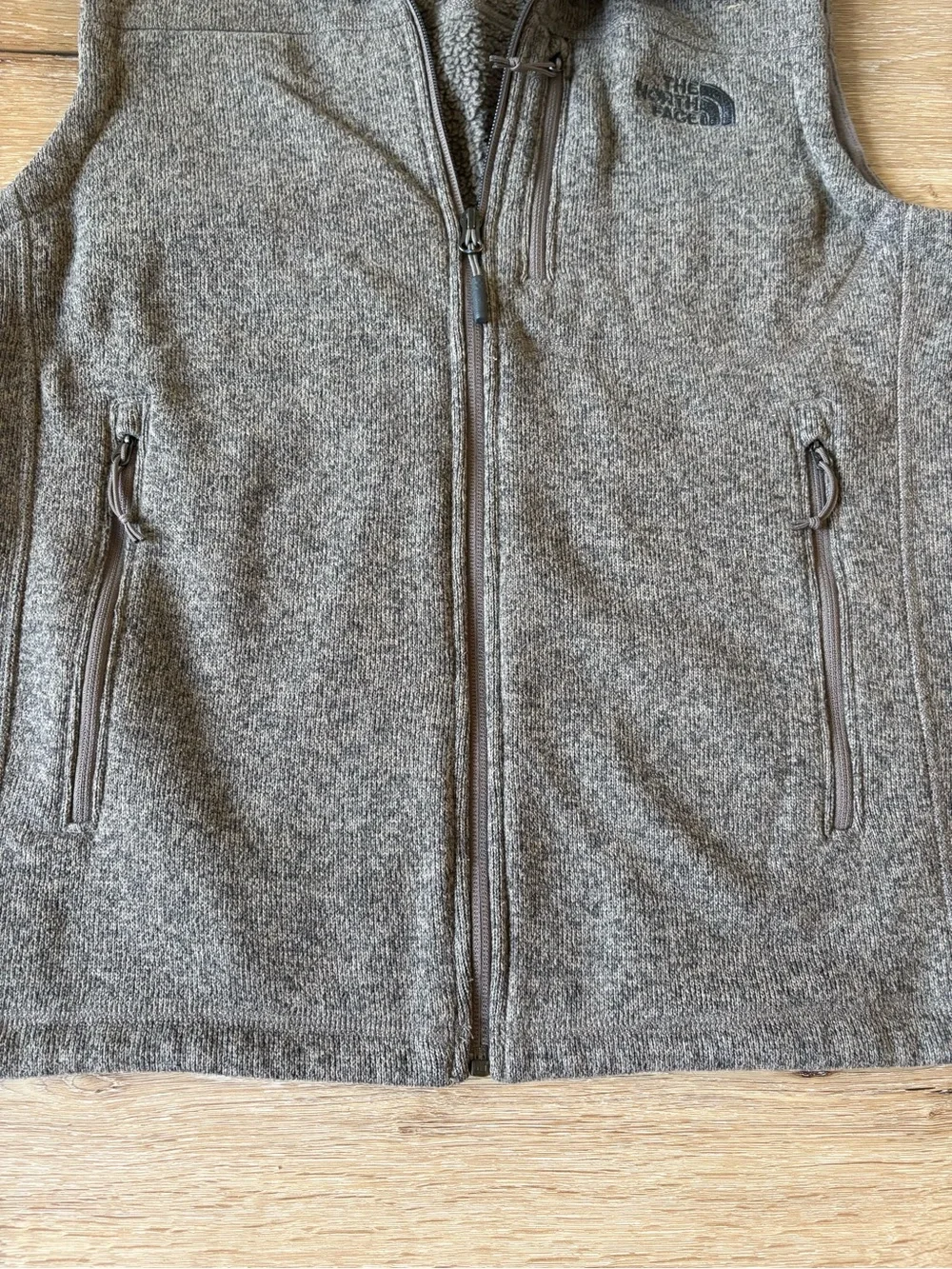 The North Face Men’s Brown Fleece Vest with zippered pockets